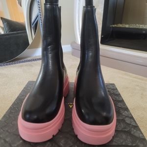 Black and Pink platform boots.